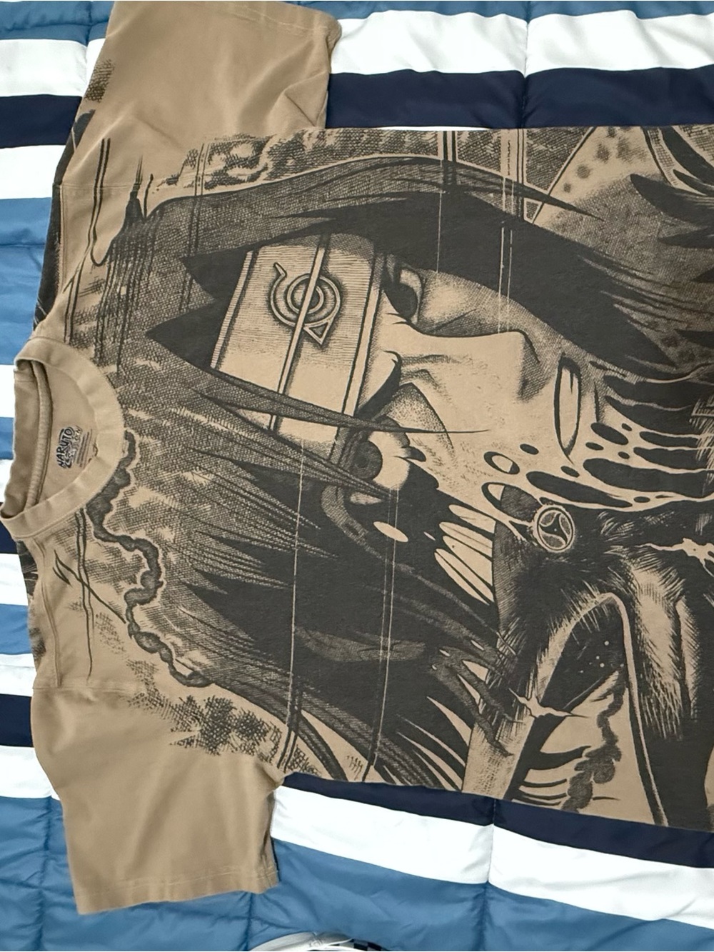 Primitive Tan Short Sleeve Tee with Black Naruto Uchiha Graphic